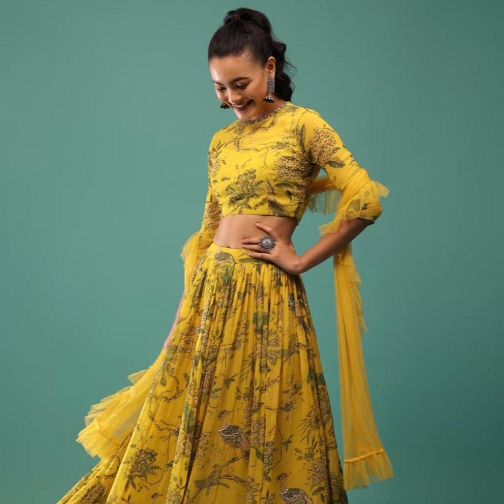Kalki Fashion: Yellow blouse and skirt set (lehenga) with floral print